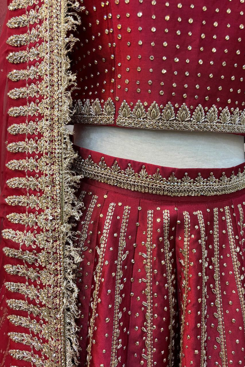 Maroon traditional outfit with gold embroidery